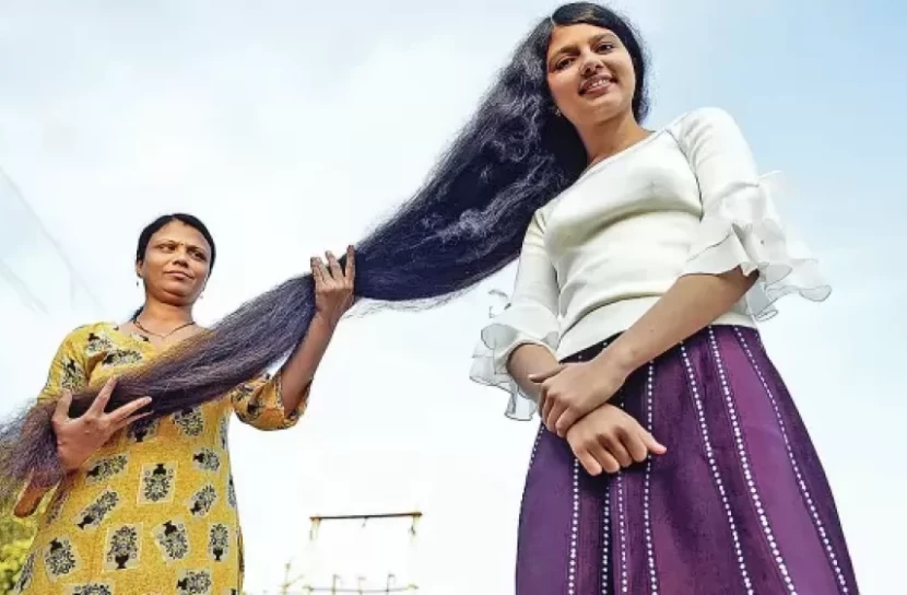 মায়ের তৈরি তেলে পৃথিবীর দীর্ঘ  চুল নিলানশির মাথায়