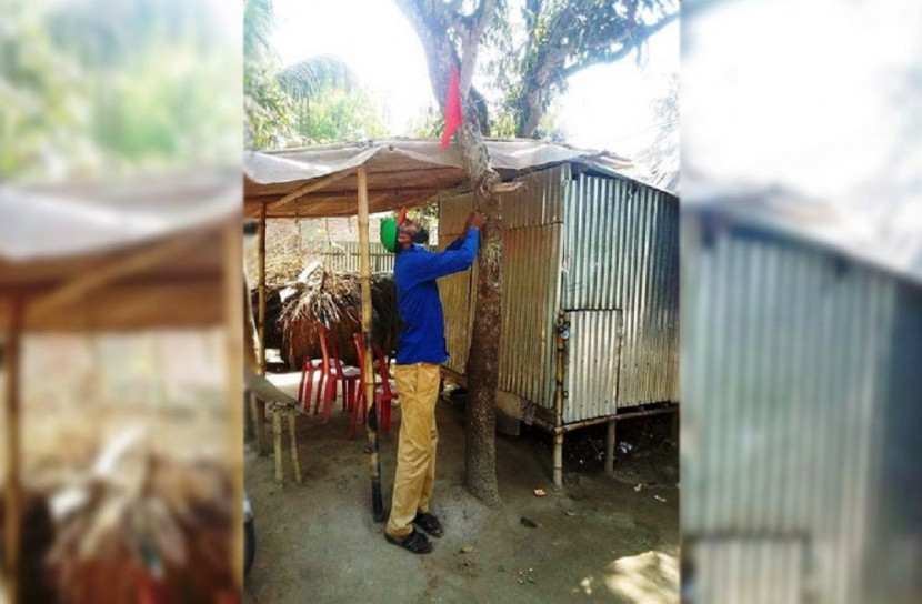 জনসচেতনতায় প্রবাসীর বাড়িতে লাল পতাকা 