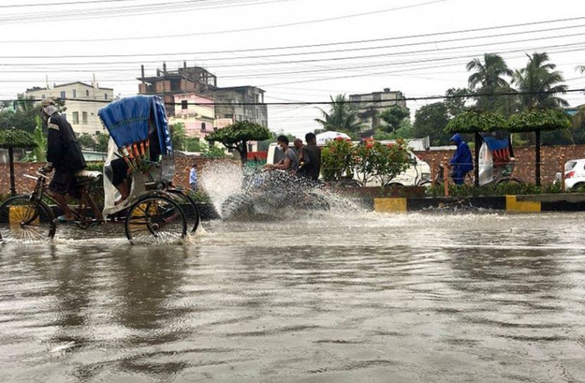 অস্বস্তির তাপদাহে স্বস্তির বৃষ্টি