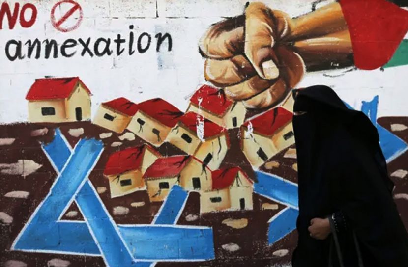 ইসরায়েলের বসতি সম্প্রসারণের বিরুদ্ধে ফিলিস্তিনি দেয়ালচিত্র