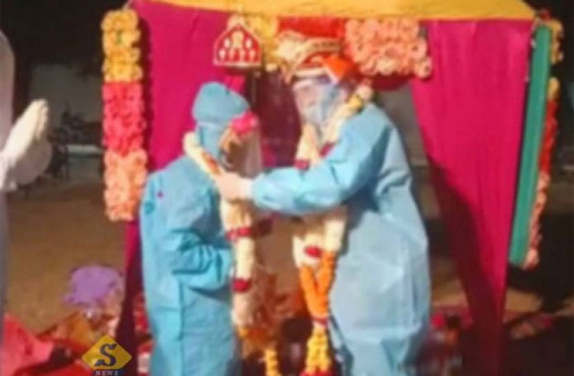 করোনা আক্রান্ত কনের পিপিই পরে বিয়ে
