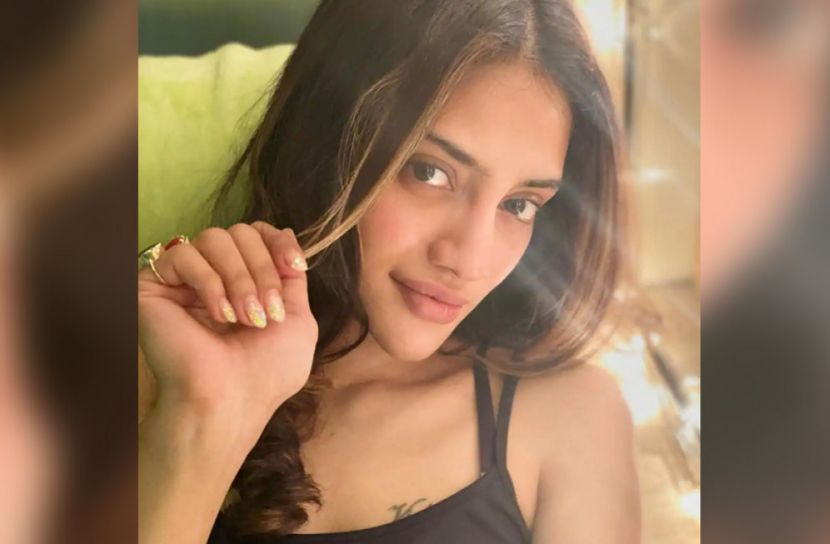 অন্তর্বাসের ফাঁকে উঁকি দিচ্ছে ট্যাটু, ছবিতে নুসরাত