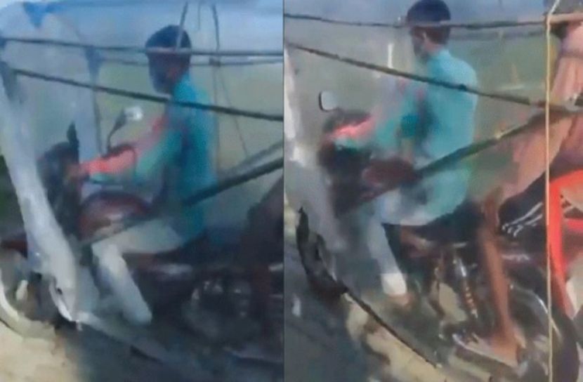 করোনা থেকে বাচঁতে প্লাস্টিক মোড়ানো বাইক !